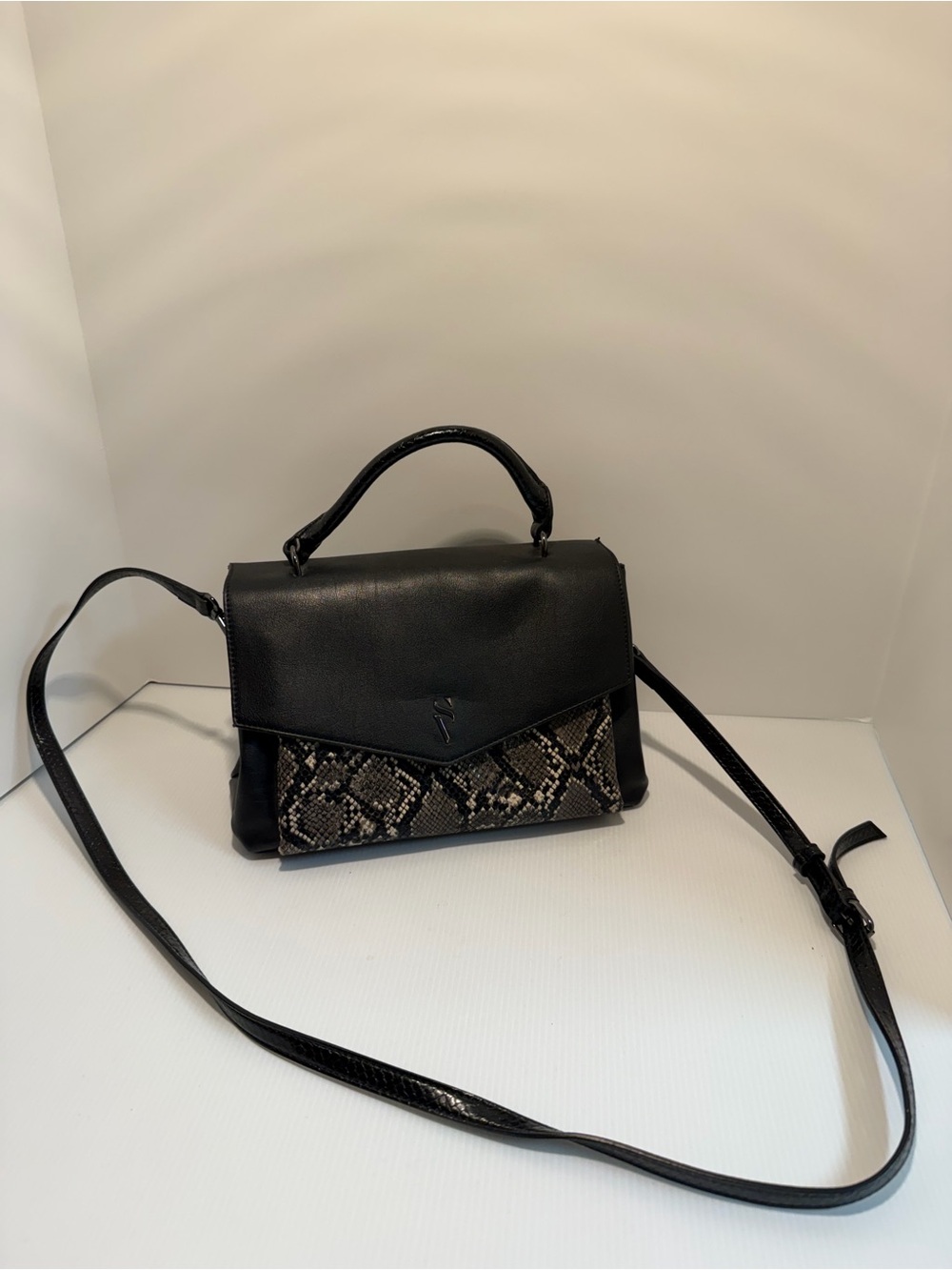 Black Top-Handle Crossbody Bag with Snake-Print Accent